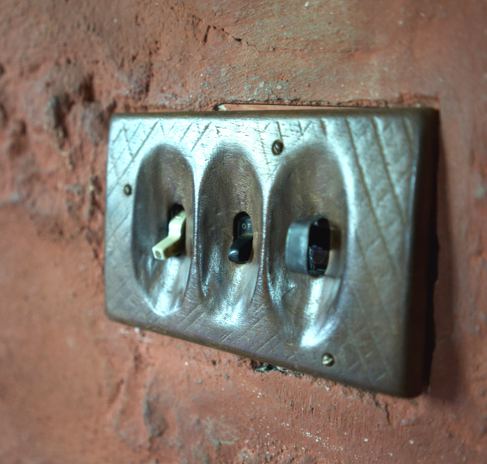 Carved light switch plates in Wharton Esherick’s Studio.